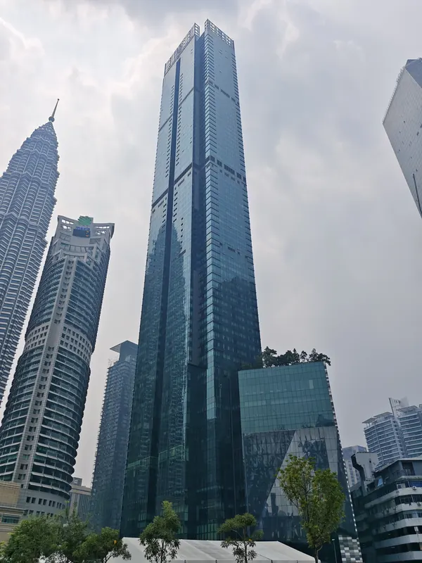 Four Seasons Place tower beside Maxis Tower, viewed from KLCC Park