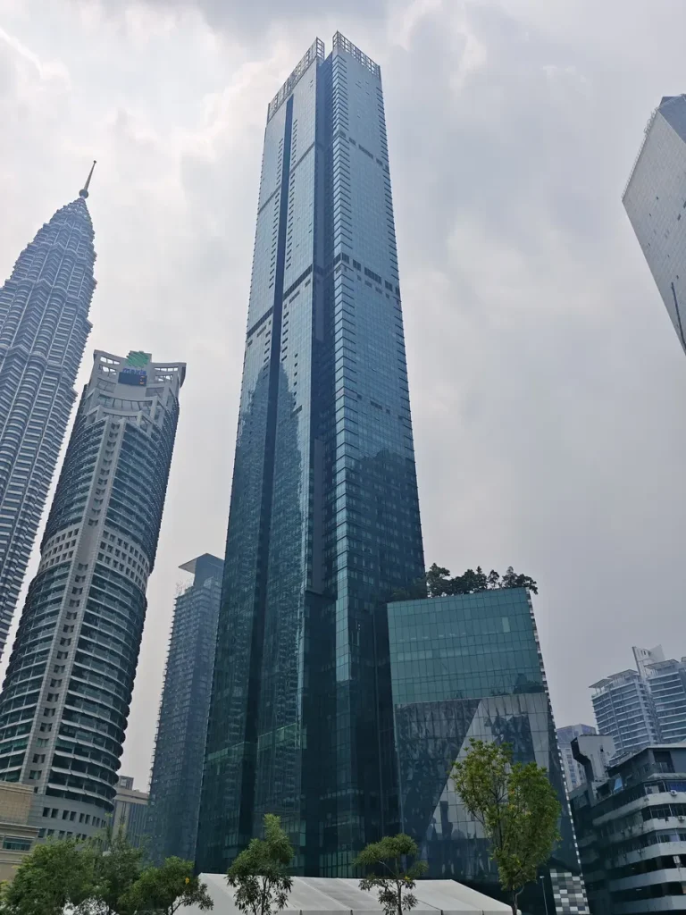 Four Seasons Place tower beside Maxis Tower, viewed from KLCC Park