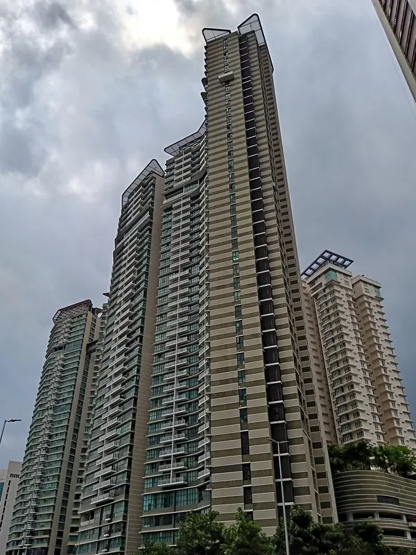 Setia Sky Residences towers rising above the street in Kuala Lumpur
