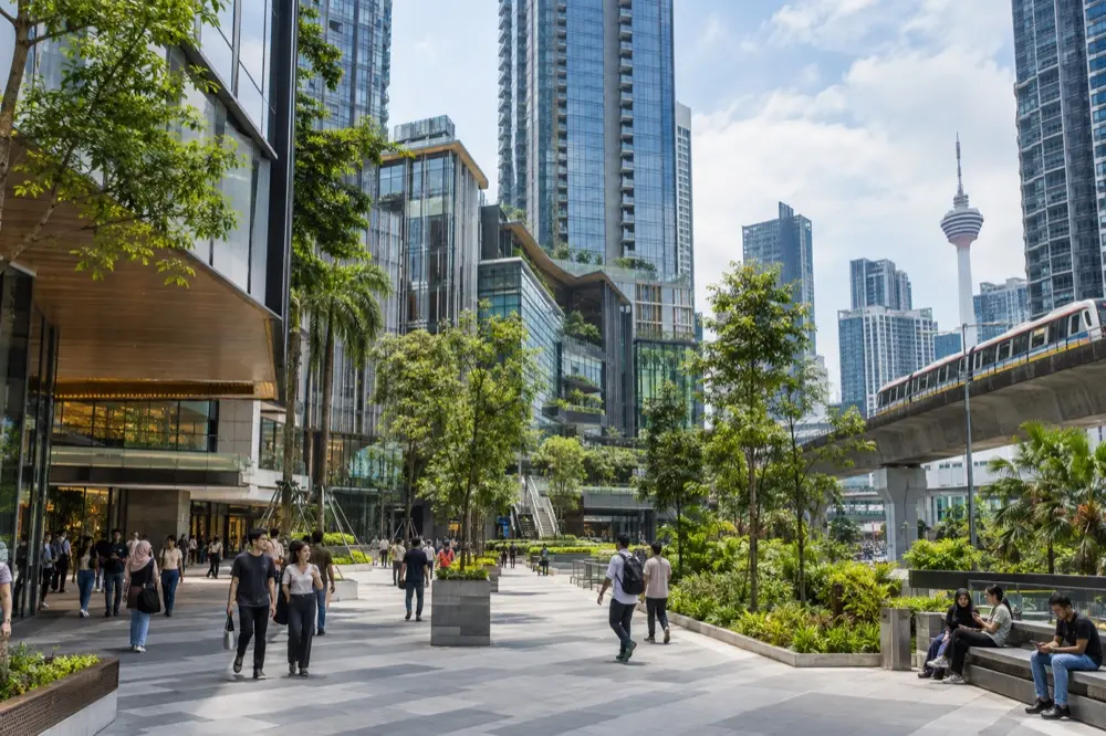 Modern residences, landscaped walkways and rail access in central Kuala Lumpur