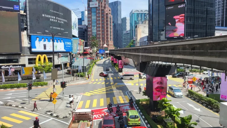 Pedestrian crossings and elevated monorail tracks at the Bukit Bintang junction